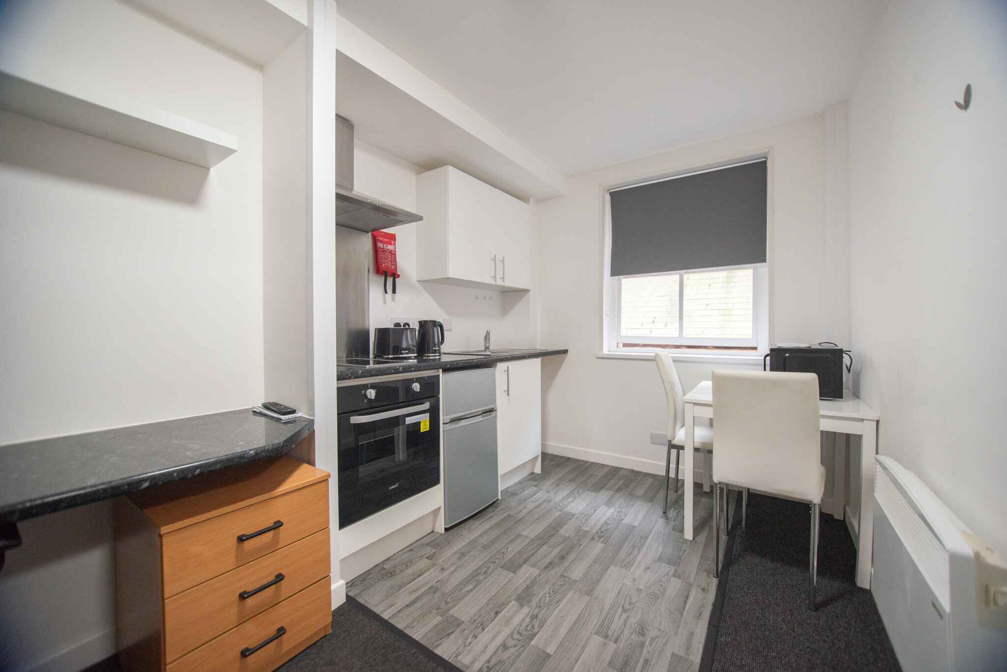 Modern apartment bedroom interior with bed and bathroom